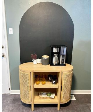 A DIY coffee bar with painted wall arch