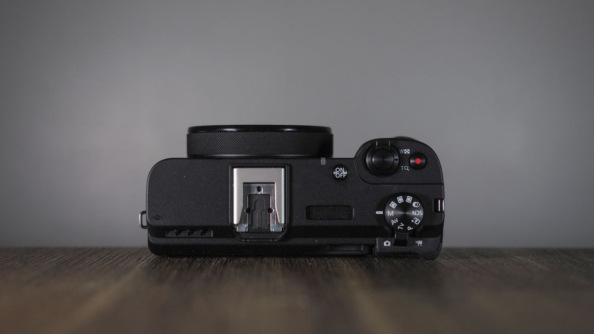 Canon PowerShot V1 on a wooden surface