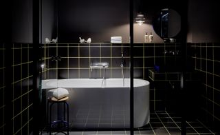 Black-clad bathroom at 25hours Das Hotel, Düsseldorf, Germany