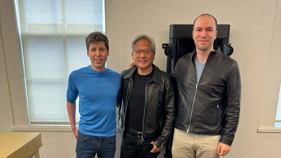 Nvidia CEO Jensen Huang took on a new side gig as a courier, delivering the world's first DGX H200 ever seen in the wild to OpenAI's Sam Altman and Gr