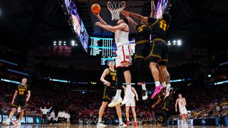  Berke B&uuml;y&uuml;ktuncel #9 of the Nebraska Cornhuskers shoots the ball during the Sweet Sixteen round game of the 2026 NCAA Men's Basketball Tournament