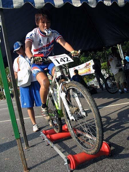 Yu Wen Huang (Chinese Taipei) warms up on the rollers.