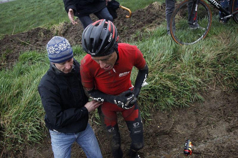 Michael Sch&auml;r (BMC) helped out of the ditch he crashed into