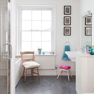 bathroom with chair and flooring
