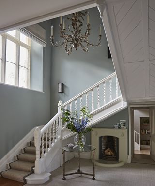 Fireplace in Old Retory placed under stairs by Sims Hilditch