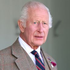 King Charles wears a tweed suit and looks worried, Princess Anne wears a navy suit jacket and looks stern