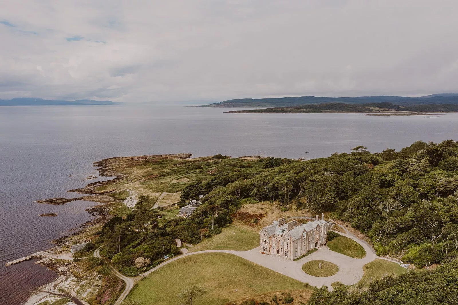 A view from above of Ronachan, a large house, looking out over the sea