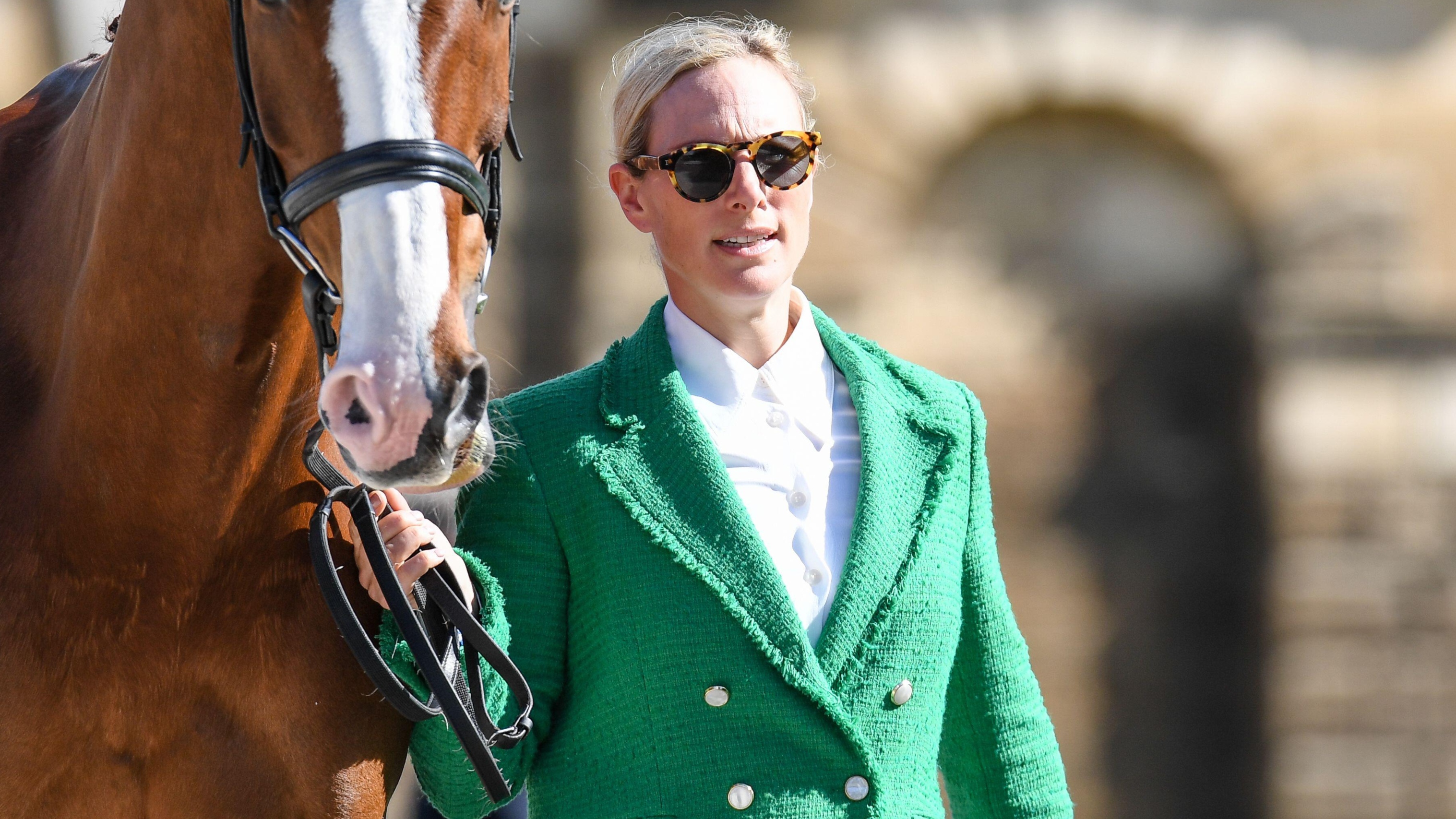 Zara Tindall holds her horse&#039;s reins at Bramham International, Bramham Park, West Yorkshire. 8th June