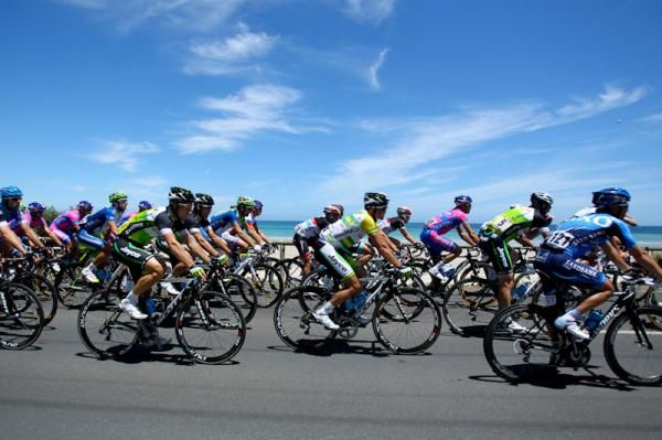 Simon Gerrans in his Australian champion's jersey against the blue sky.