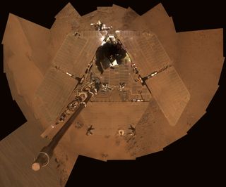 This self-portrait shows the Opportunity Mars rover and the dust accumulation on its solar panels as the mission approached its fifth Martian winter. With winter over and wind cleaning the panels, the robot is ready to roll again.