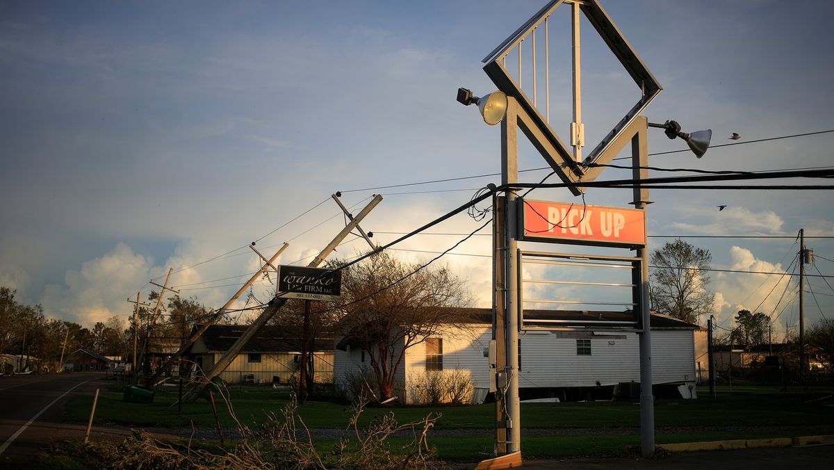 A Domino&#039;s Pizza sign damaged by Hurricane Ida in Raceland, Louisiana, on Monday, Aug. 30, 2021.