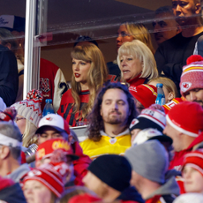 Taylor Swift reacts with Donna Kelce during the game between the Buffalo Bills and the Kansas City Chiefs at GEHA Field at Arrowhead Stadium on December 10, 2023 in Kansas City, Missouri.