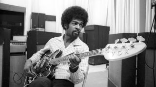 Bassist Larry Graham of the psychedelic soul group 'Sly And The Family Stone' plays a Vox electric bass as he works on an album for the 'Spaulding Wood Affair' which Sly Stone was producing on June 25, 1968 in New York, New York.