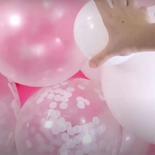 pink balloon and white balloon