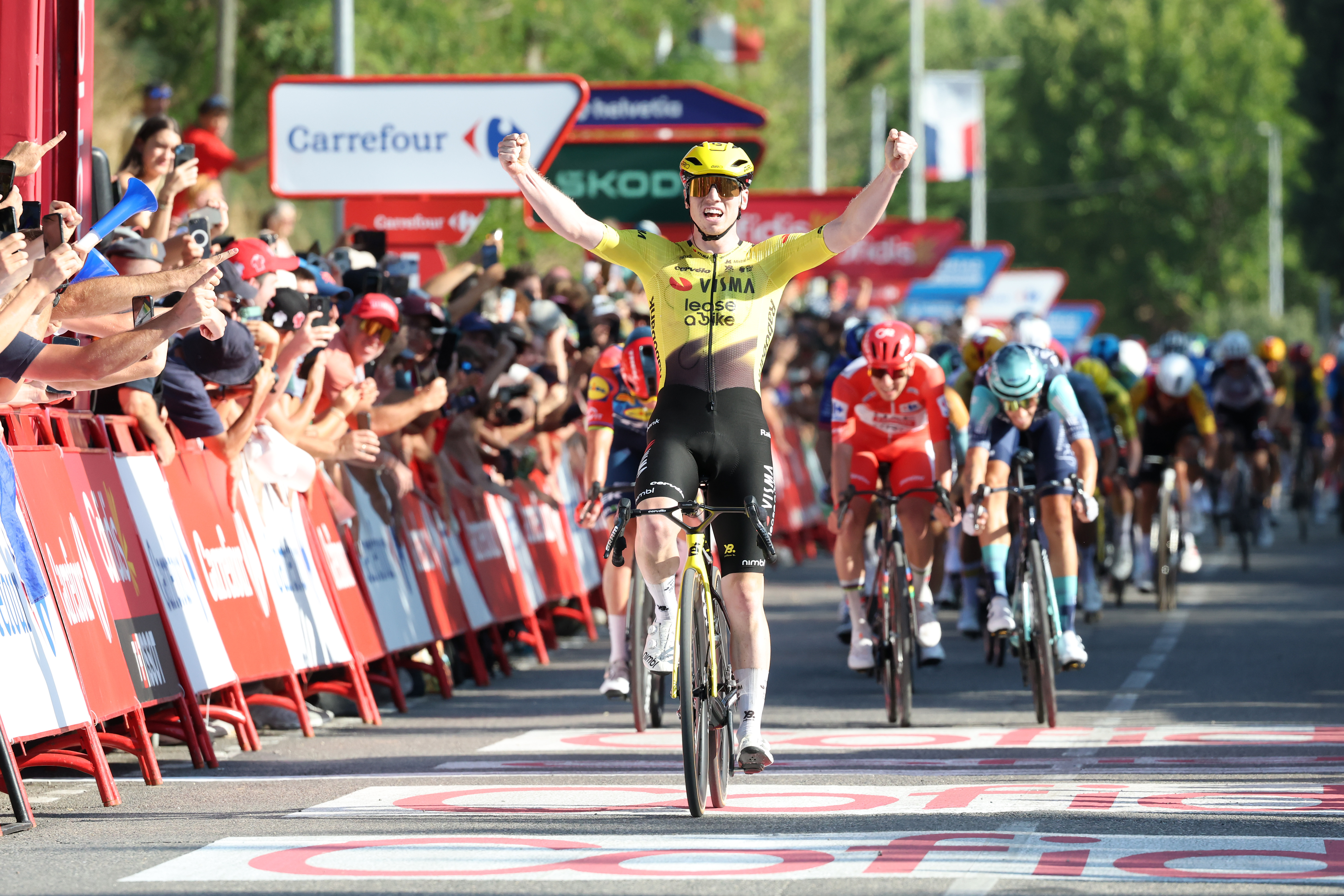 Matthew Brennan of Great Britain and Team Visma | Lease a Bike celebrates at finish line as stage winner during the La Vuelta