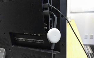Google Chromecast just sits behind the screen