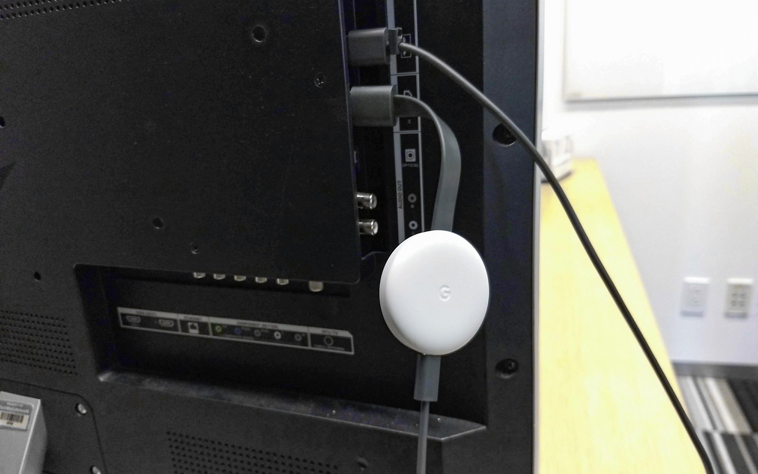 Google Chromecast is behind the screen