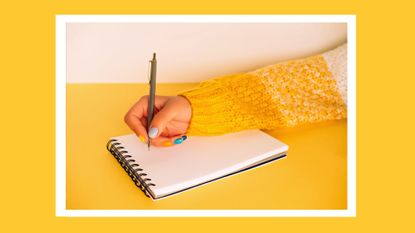 What are dopamenus? Pictured: Woman in yellow white knitted sweater with bright multi colored manicure is writing in notebook sitting at yellow table