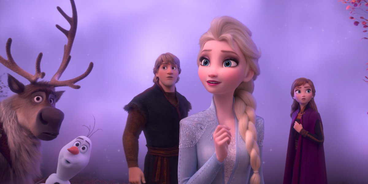 Sven, Olaf, Kristoff and Anna look intrigued as they stand behind Elsa in a scene from Frozen II