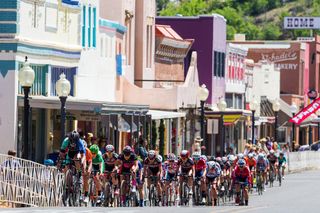 The women's peloton comes up the straightaway during stage 4 of the Tour of The Gila