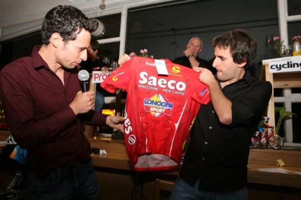 Daniel Friebe and Daniel Benson offer up a Saeco team jersey.
