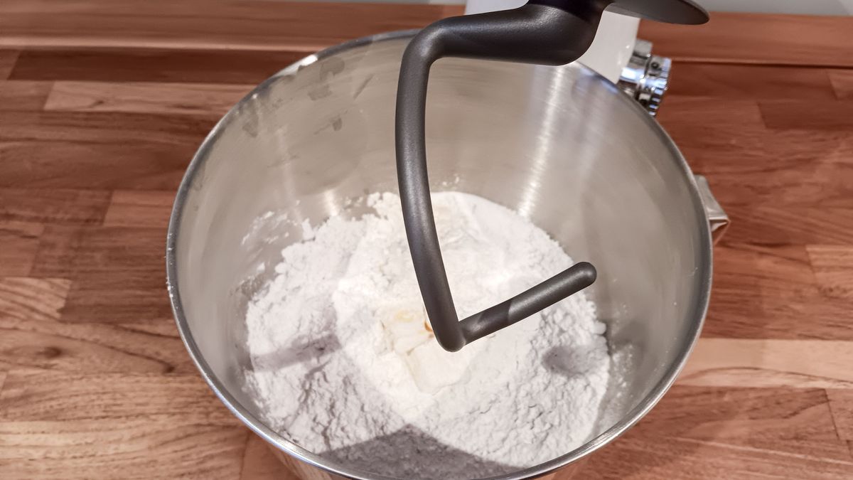 Flour and butter being mixed for a bread dough in the Cuisinart Precision stand mixer