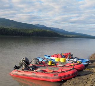 The inflatable boats (aka "dinobarge") used to travel down the Yukon River where the scientists found thousands of dinosaur footprints.