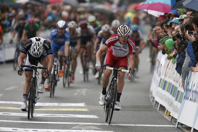 Alexander Kristoff (Katusha) sprints the finish line ahead of John Degenkolb (Giant-Shimano)