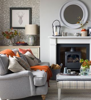grey living room with wallpaper in alcove