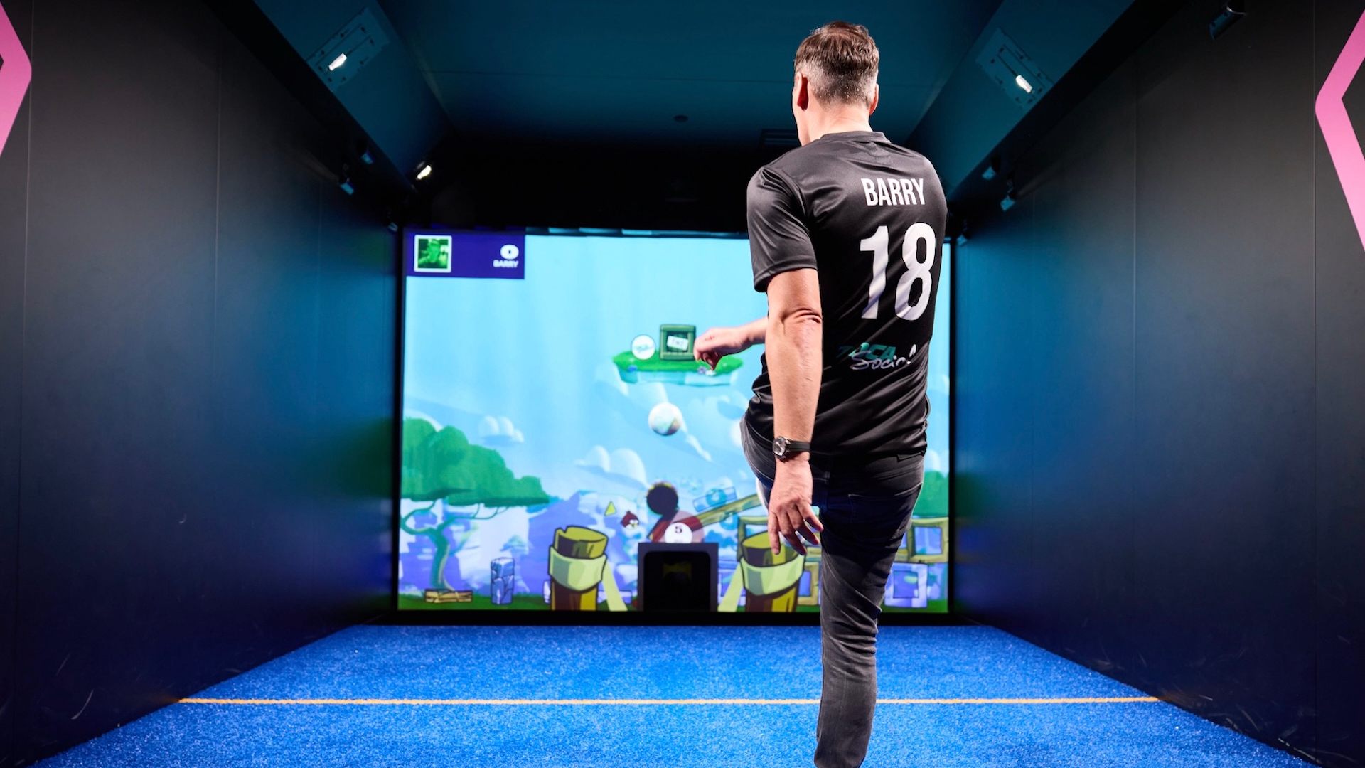 Gareth Barry playing the Angry Birds game at TOCA Social 