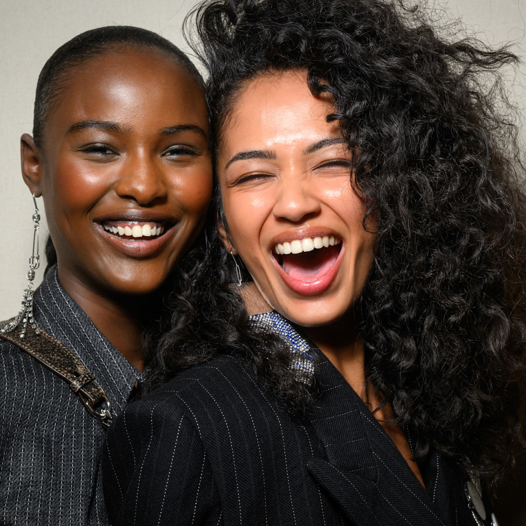 two models backstage at Marant fall 2025 show smiling 
