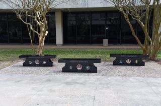 The new benches outside of NASA's Mission Control Center at the Johnson Space Center in Houston stand for three periods of flight control: Gemini and Apollo; Skylab and Apollo-Soyuz Test Project; and the space shuttle.