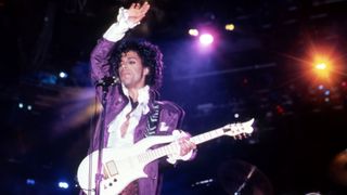 Prince (1958-2016) performs onstage during the 1984 Purple Rain Tour on November 4, 1984, at the Joe Louis Arena in Detroit, Michigan.