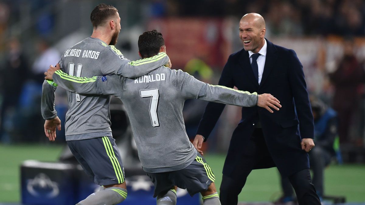 Sergio Ramos and Cristiano Ronaldo celebrate with Zinedine Zidane