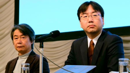Shuntaro Furukawa (R), president of Japan's video game company Nintendo, and representative director Shigeru Miyamoto (L) attend a briefing of the company's financial results at a hotel in Tokyo on January 31, 2020. - Japanese gaming giant Nintendo reported a leap in sales and profit for the nine months to December, upgrading its full-year profit forecast on strong demand for its popular Switch console. 