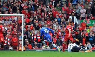 LIVERPOOL, ENGLAND - APRIL 27: (THE SUN OUT, THE SUN ON SUNDAY OUT) Demba Ba of Chelsea scores to make it 0-1 during the Barclays Premier League match between Liverpool and Chelsea at Anfield on April 27, 2014 in Liverpool, England. (Photo by John Powell/Liverpool FC via Getty Images)