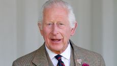 King Charles III (wearing a Royal Marines tie) attends The Braemar Gathering 2024 at The Princess Royal and Duke of Fife Memorial Park on September 7, 2024
