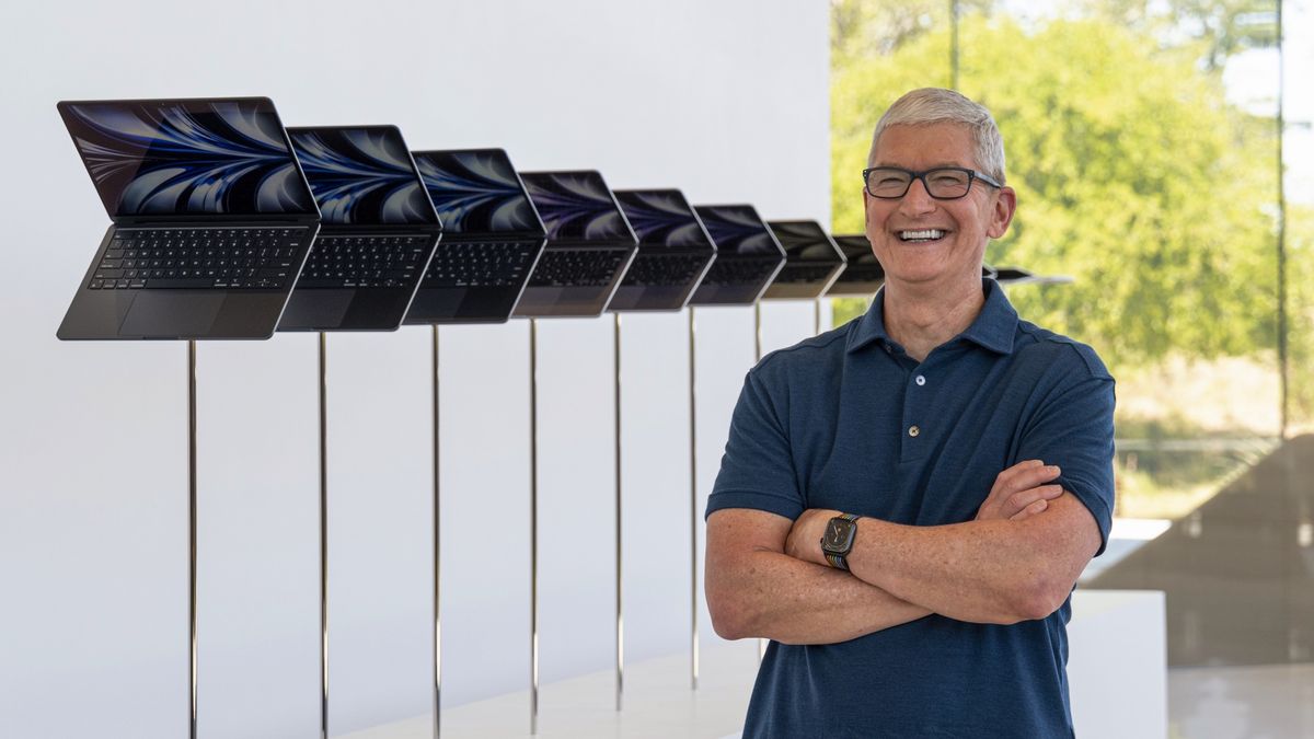 Tim Cook standing next to new MacBook Air 