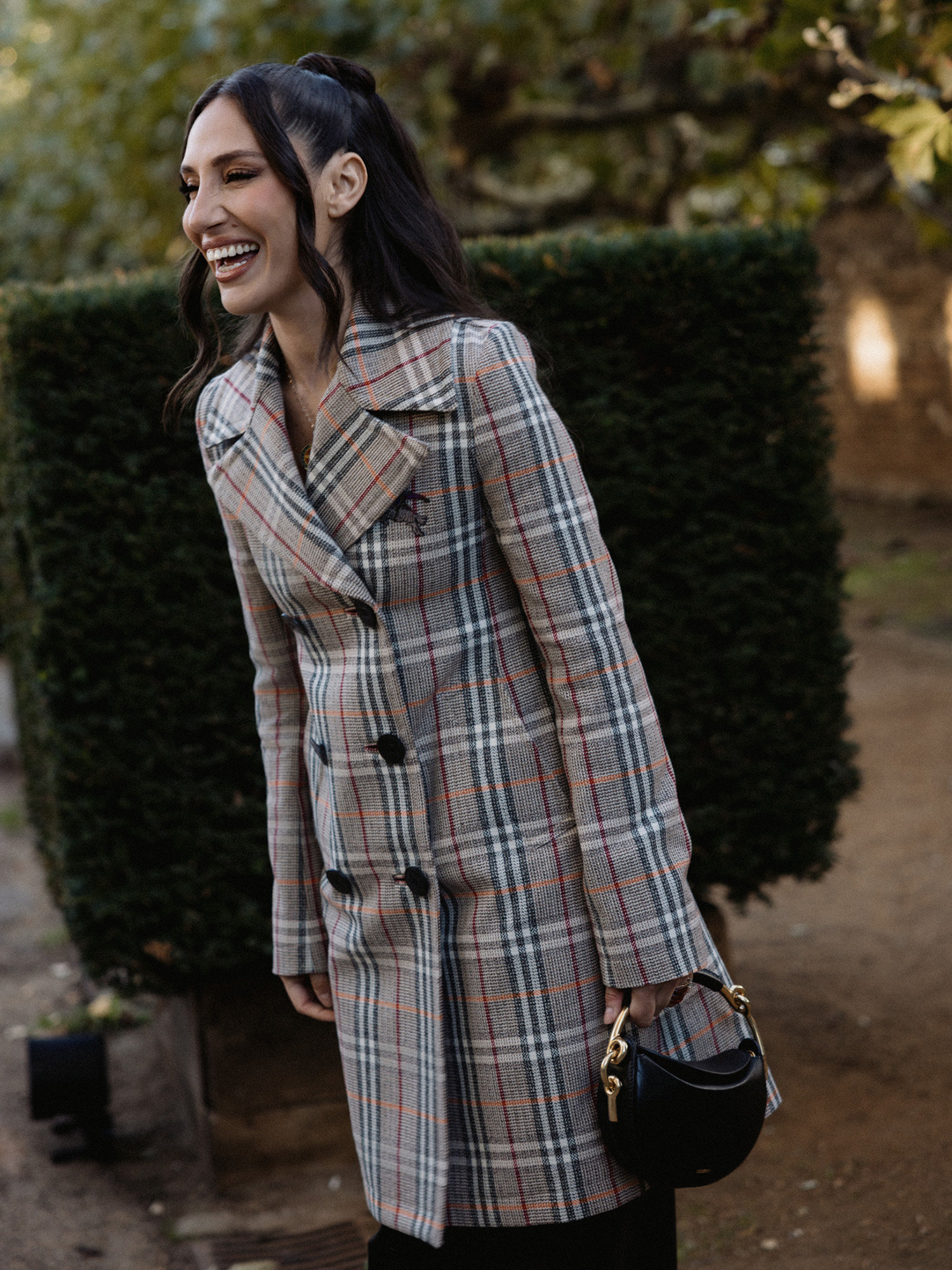 Tefi Pessoa getting ready to attend the Burberry Spring 2026 runway show
