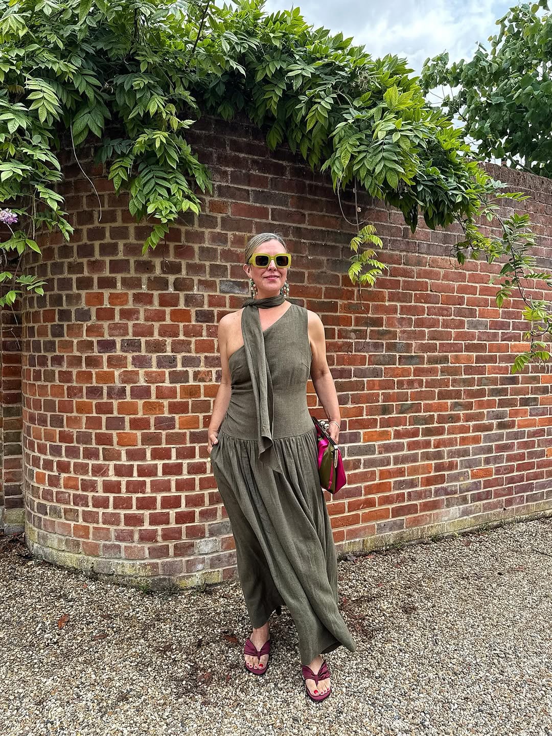 woman wearing midi dress with matching neck scarf summer 2025