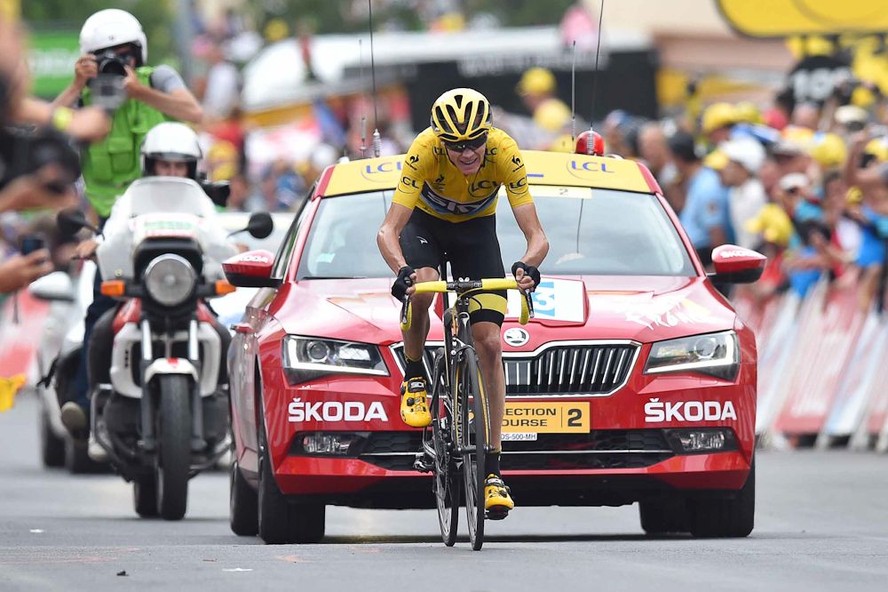 Chris Froome nears the finish of stage 19