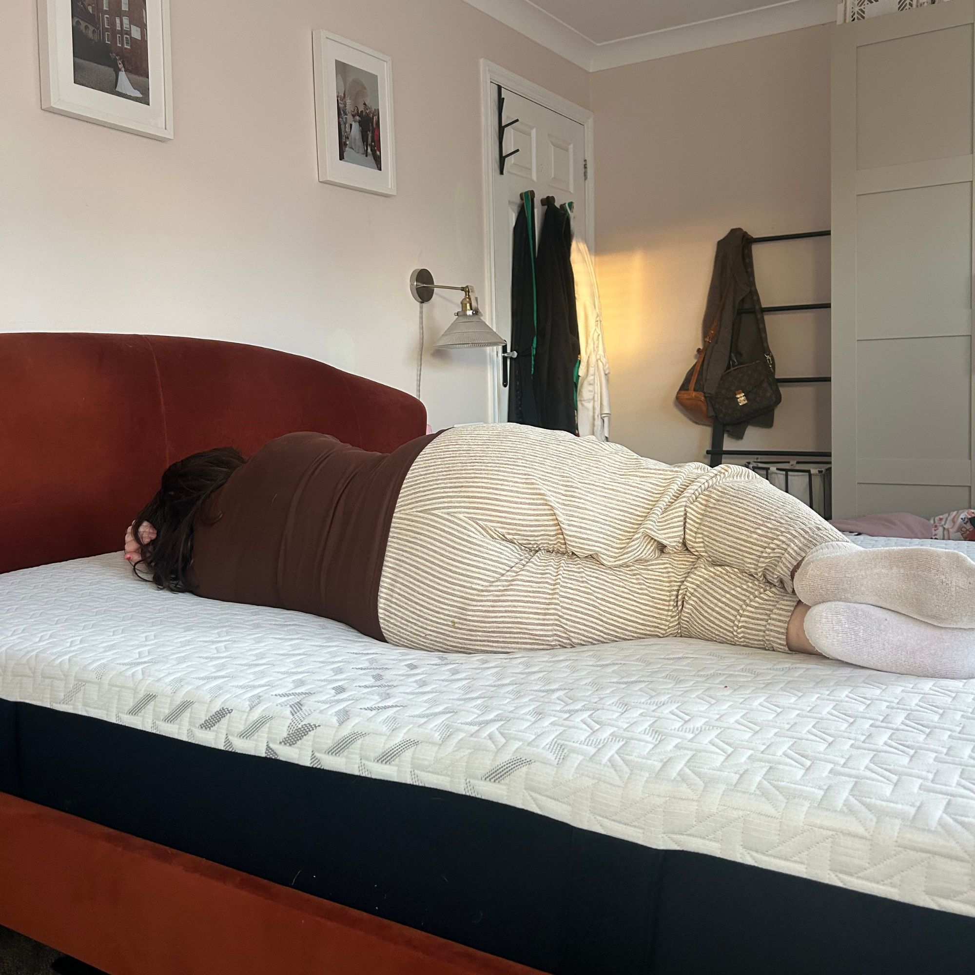Nectar mattress with Annie sleeping on side