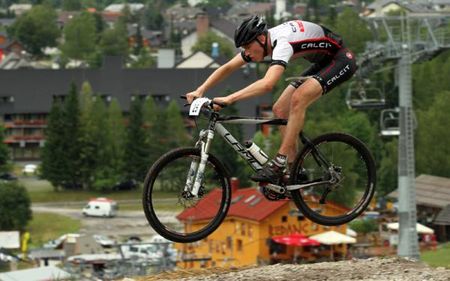 A cross country rider gets some air in Kranjska Gora, Slovenia.