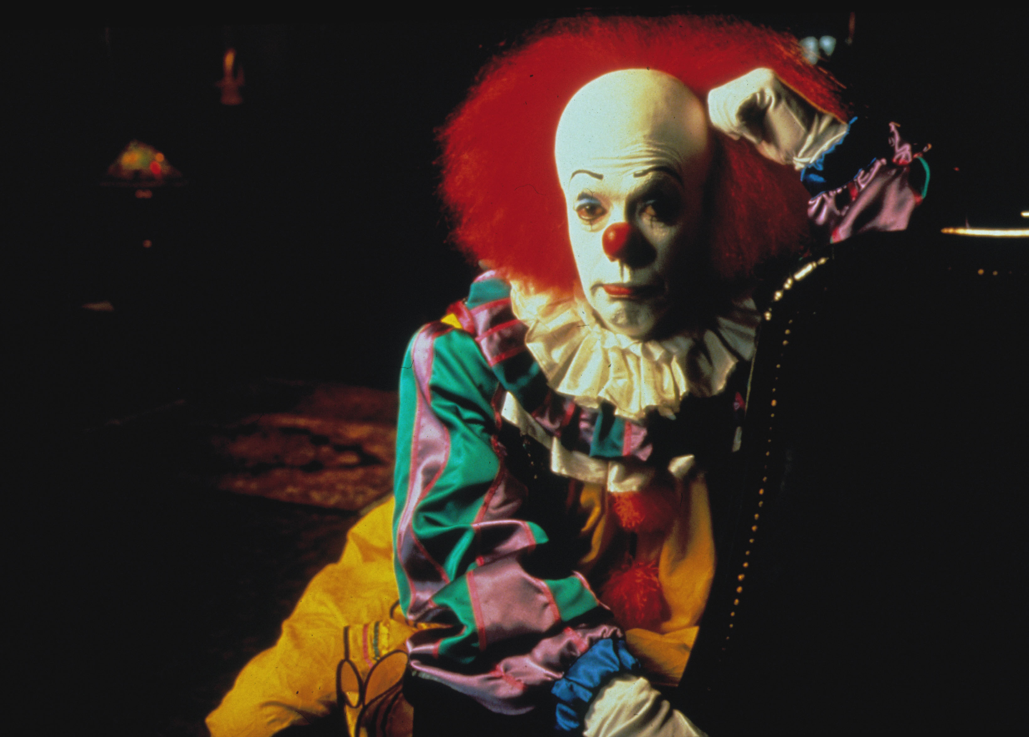 Tim Curry in Stephen King's IT, one of the best scary movies on Hulu