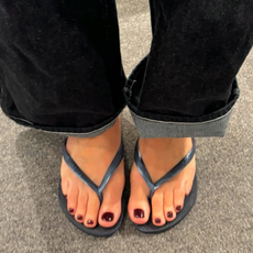 beautifully pedicured feet in sandals