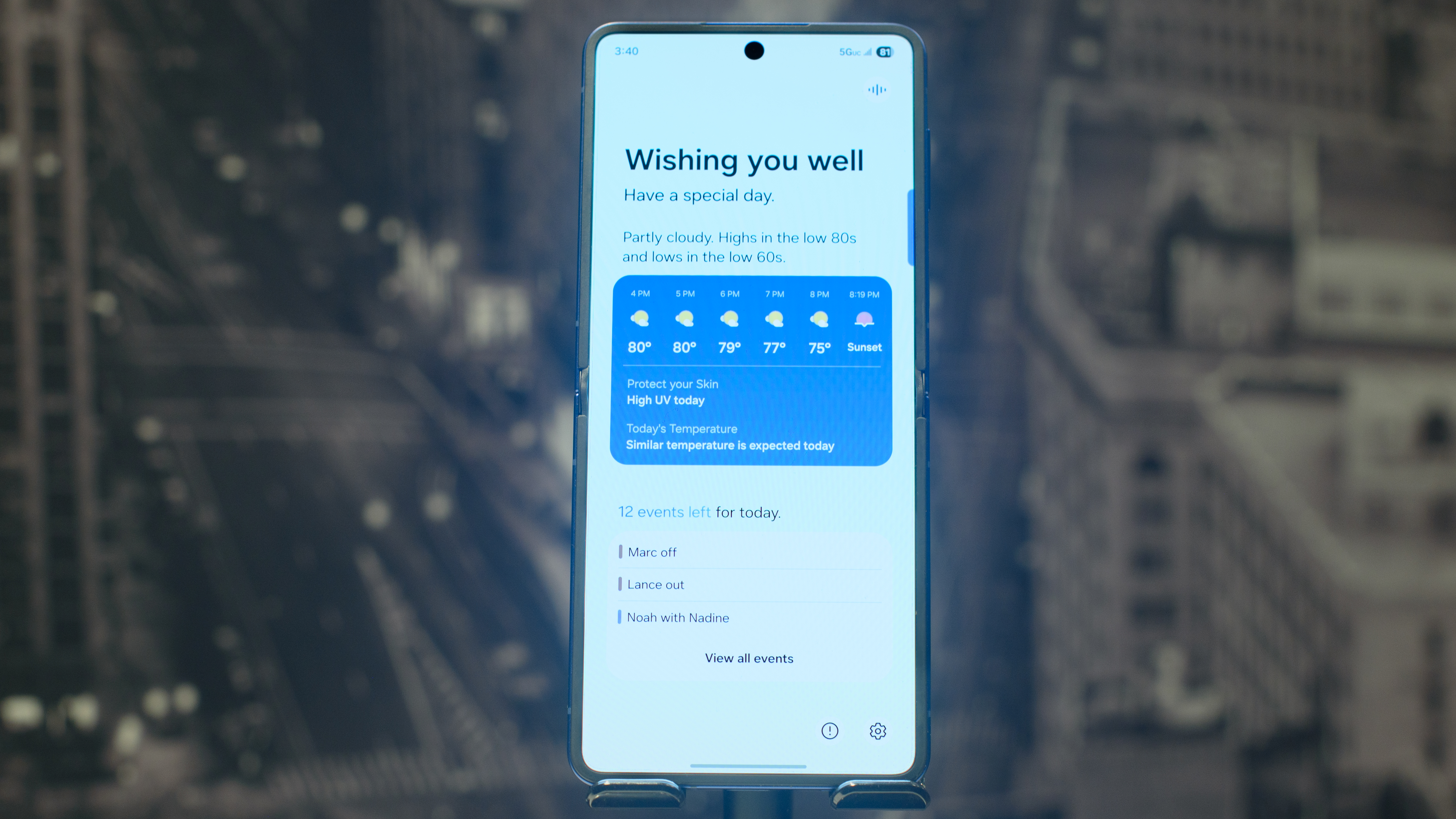 Samsung Galaxy Z Flip 7 in blue showing the Now Brief screen that says Wishing You Well Have a Special Day