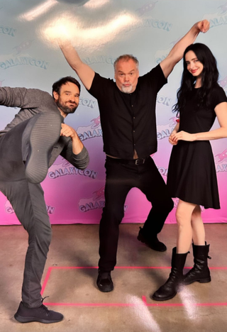 Charlie Cox, Vincent D'Onofrio and Krysten Ritter posing for picture together