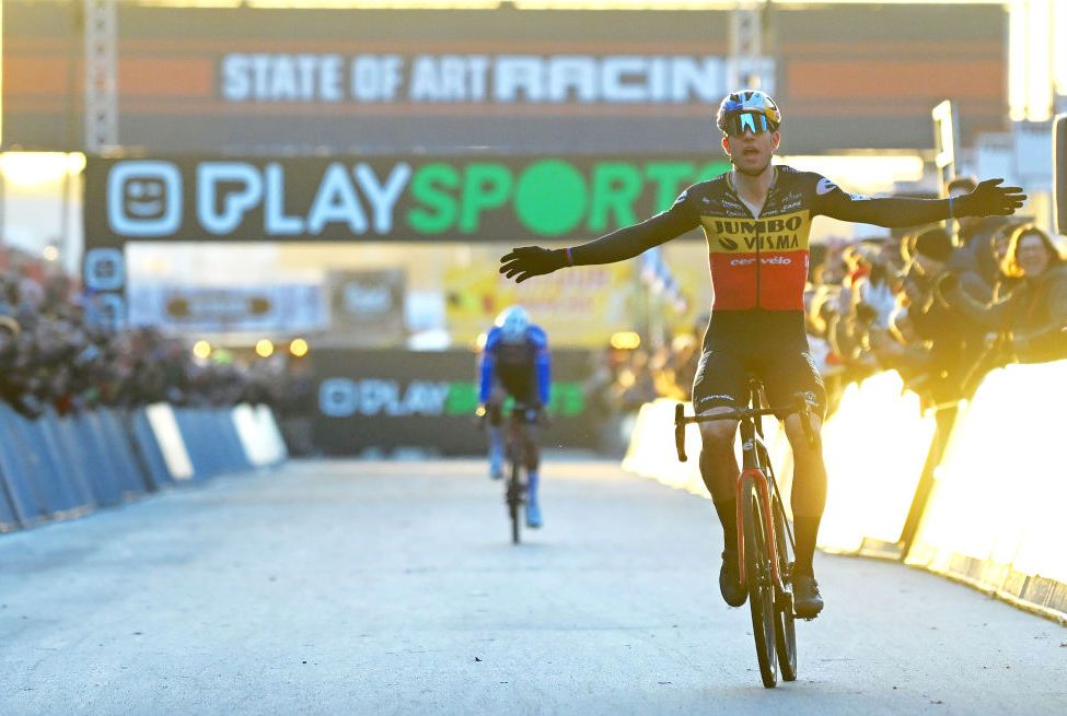 ZOLDER, BELGIUM - DECEMBER 27: Wout Van Aert of Belgium and Team Jumbo-Visma celebrates at finish line as race winner ahead of Mathieu Van Der Poel of The Netherlands and Team Alpecin-Deceuninck during the 18th Superprestige Heusden-Zolder 2022 - Men's Elite / #Superprestige2023 / on December 27, 2022 in Zolder, Belgium. (Photo by Luc Claessen/Getty Images)
