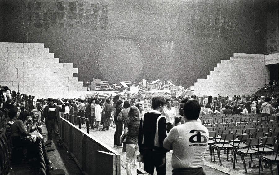 The crowd linger in the venue after The Wall concert, Earls Court