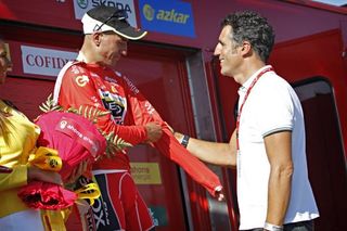 Miguel Indurain (right) congratulates 2011 Vuelta winner Juan Jose Cobo